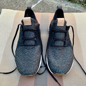 New Balance Men’s size 9.5 grey and black 
with gum sole.